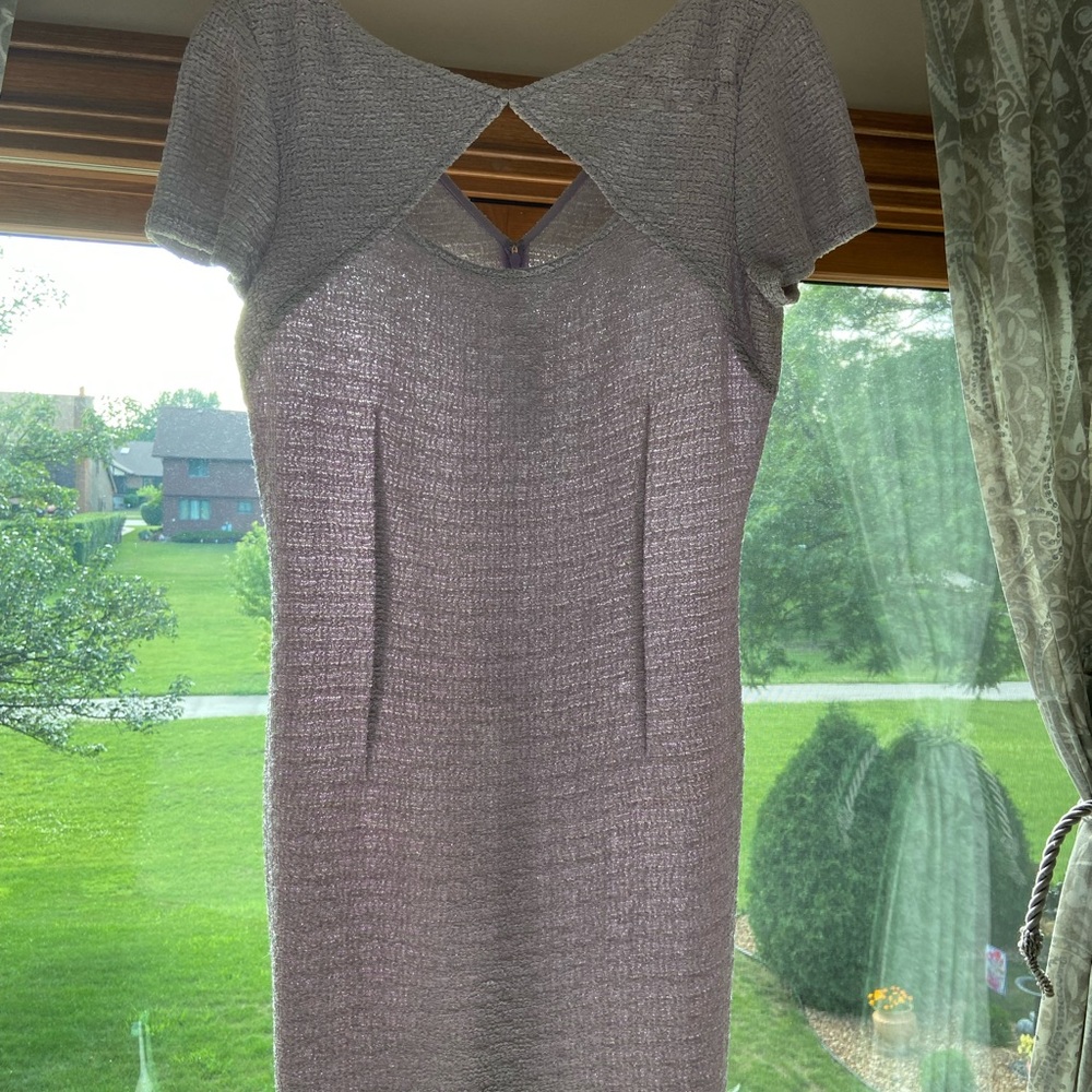 Light color lavender knit.  With metallic threading.  A true classic St John.